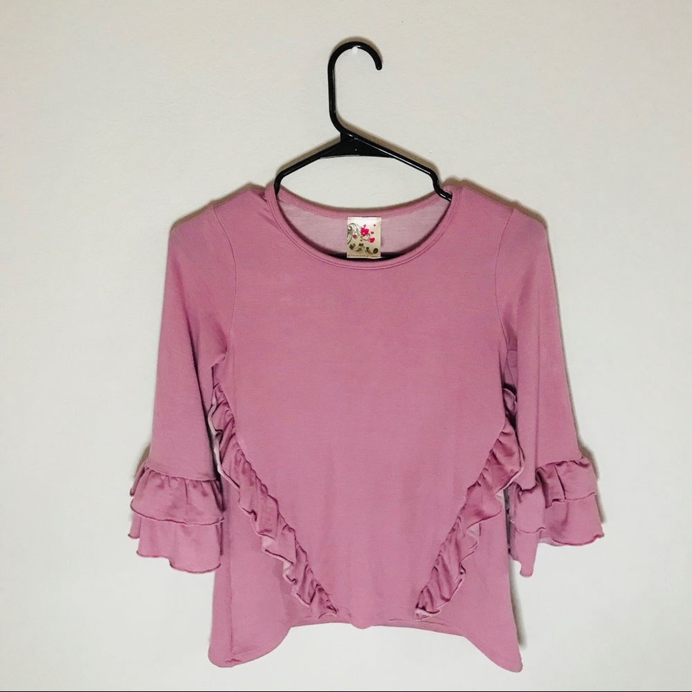 Pink long sleeved shirt . The size is M.